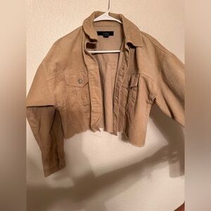 Corduroy style tan jacket cropped.